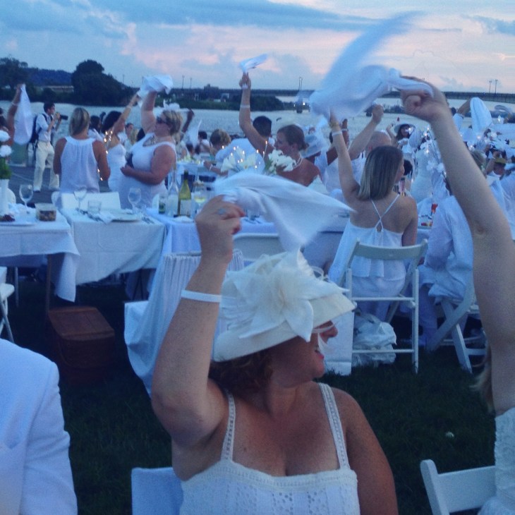 The waving of napkins in the air marks the beginning of the event