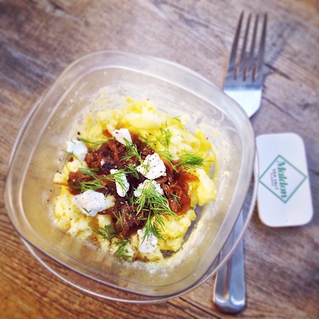 Breakfast: scrambled eggs with caramelized onions and goat cheese