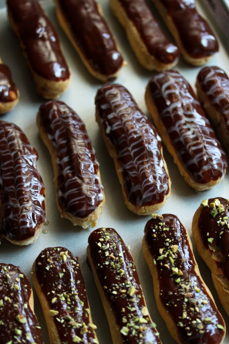 From top to bottom: chocolate, vanilla bean, and pistachio eclairs